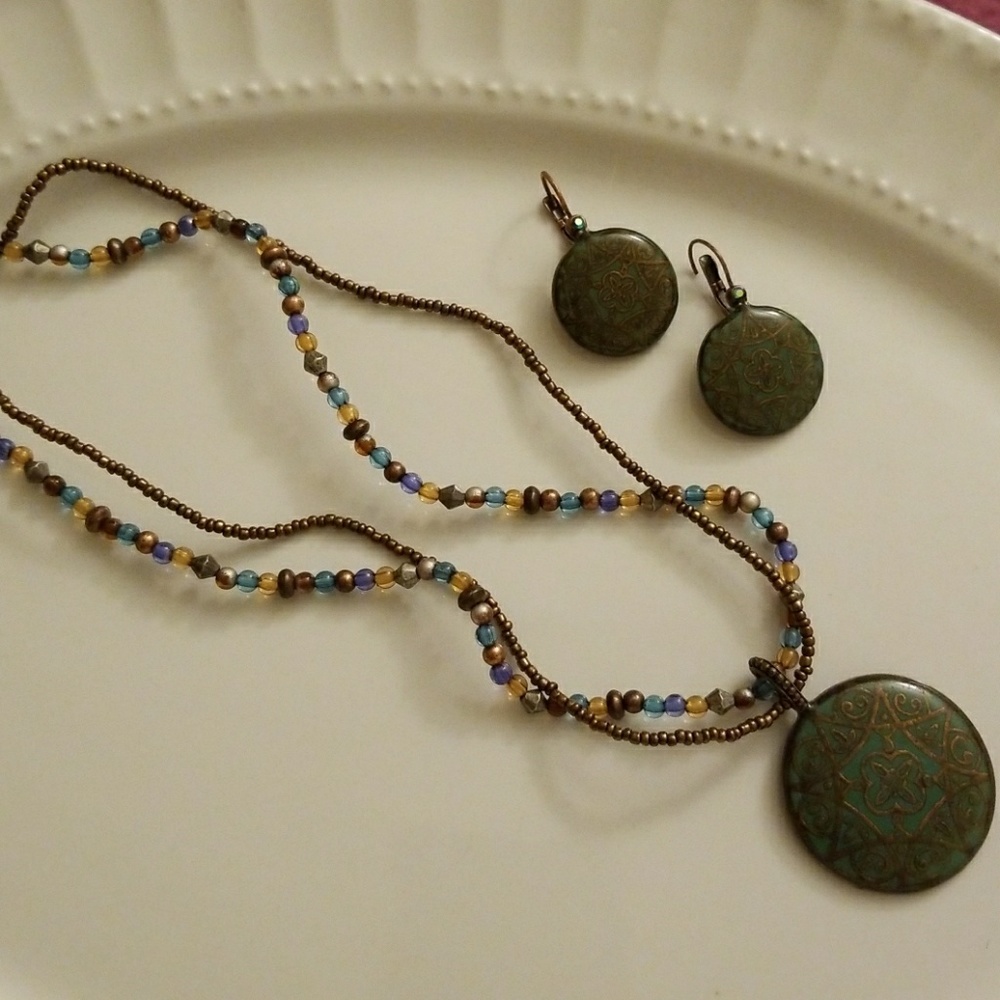 Avon medallion beaded necklace and earring set.